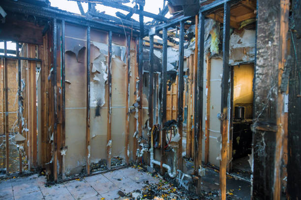 Professional Fire Damage Restoration technician working in Highland Lakes, NJ